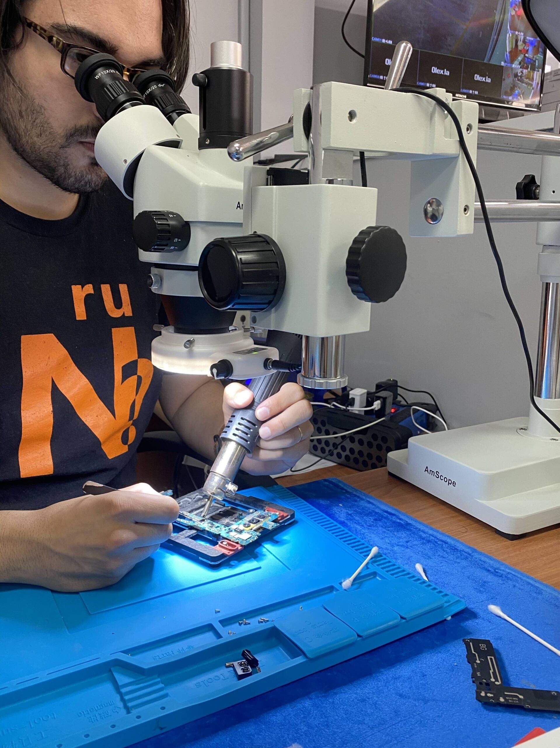 Luis's early electronics repair workstation